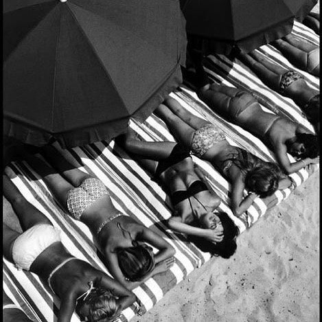St. Tropez, 1959. Photographed by Elliot Erwitt.